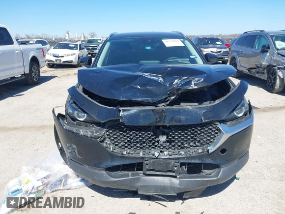 2022 Mazda CX-30 S Select z VIN 3MVDMBBL7NM413447, wystawiony jako IAAI lot #41772804 z przebiegiem 69 102 mil mil oraz . Historia ofert i sprzedaży dostępna na DreamBid. Obrazek 12.