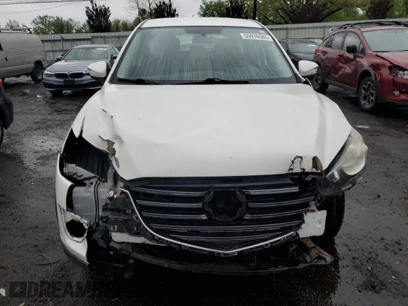 2016 Mazda CX-5 Sport z VIN JM3KE4BY2G0802376, wystawiony jako Copart lot #55976585 z przebiegiem 112 600 mil mil oraz Szkoda całkowita • Salvage title. Historia ofert i sprzedaży dostępna na DreamBid. Obrazek 5.