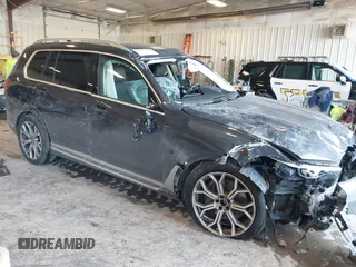 2021 BMW X7 xDrive40i with VIN 5UXCW2C09M9E94039, listed as a IAAI auction lot 41473138 with 1 mi miles. Bid and sale history available at carsss.com. Image 1.
