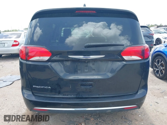 2020 Chrysler Pacifica Touring L with VIN 2C4RC1BG6LR173126, listed as a IAAI auction lot 42517961 with 75,014 mi miles and . Bid and sale history available at DreamBid. Image 17.