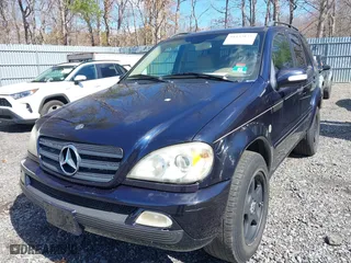 2003 Mercedes-Benz M-Class 3.7L with VIN 4JGAB57E03A418713, listed as a IAAI auction lot 41835875 with 195,982 mi miles. Bid and sale history available at carsss.com. Image 2.