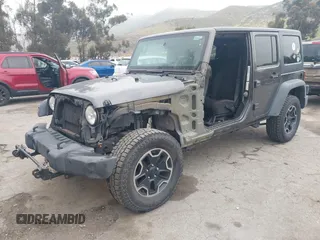 2014 Jeep Wrangler Unlimited Sport with VIN 1C4BJWDG7EL244749, listed as a IAAI auction lot 41871127 with 128,420 mi miles and . Bid and sale history available at DreamBid. Image 19.