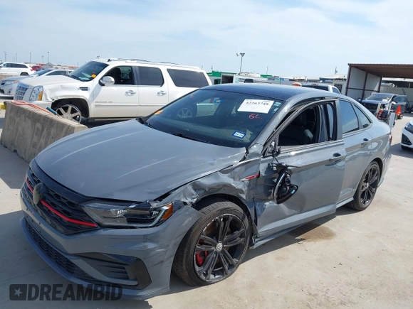 2020 Volkswagen Jetta GLI S z VIN 3VW6T7BU0LM047800, wystawiony jako IAAI lot #42263748 z przebiegiem 58 903 mil mil oraz . Historia ofert i sprzedaży dostępna na DreamBid. Obrazek 20.