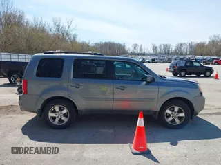 2009 Honda Pilot EX-L z VIN 5FNYF48699B034440, wystawiony jako IAAI lot #42090862 z przebiegiem 208 741 mil mil oraz . Historia ofert i sprzedaży dostępna na DreamBid. Obrazek 13.