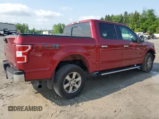 2018 Ford F-150 XL with VIN 1FTEW1EG6JFA90964, listed as a Copart auction lot 59808695 with 144,626 mi miles and Salvage title. Bid and sale history available at DreamBid. Image 3.