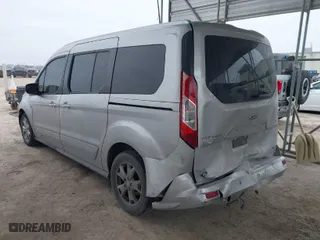 2016 Ford Transit Connect Wagon XLT with VIN NM0GE9F79G1233126, listed as a IAAI auction lot 41622521 with 240,033 mi miles. Bid and sale history available at carsss.com. Image 3.