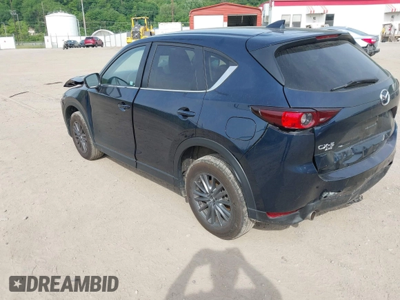 2021 Mazda CX-5 Touring z VIN JM3KFBCMXM0389857, wystawiony jako IAAI lot #42309650 z przebiegiem 49 938 mil mil oraz . Historia ofert i sprzedaży dostępna na DreamBid. Obrazek 3.