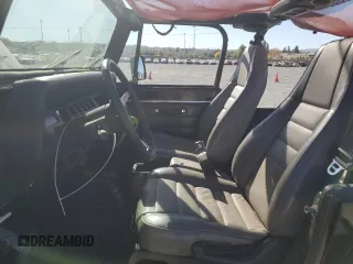1995 Jeep Wrangler S with VIN 1J4FY19P7SP209782, listed as a Copart auction lot 84476294 with 157,029 mi miles and Salvage Title. Bid and sale history available at carsss.com. Image 7.