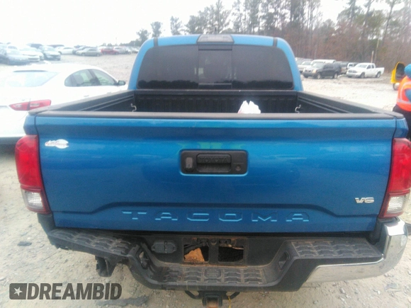 2018 Toyota Tacoma SR5 with VIN 3TMAZ5CN3JM066409, listed as a IAAI auction lot 41204775 with 75,000 mi miles and . Bid and sale history available at DreamBid. Image 16.