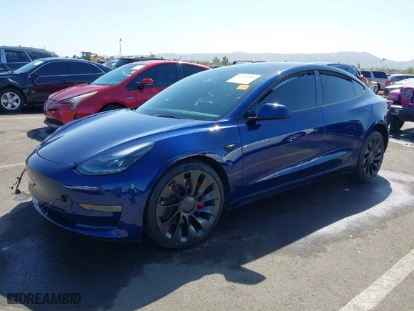 2022 Tesla Model 3 Performance with VIN 5YJ3E1EC4NF347055, listed as a IAAI auction lot 41713504 with 38,266 mi miles. Bid and sale history available at carsss.com. Image 2.