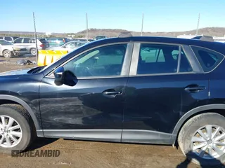 2016 Mazda CX-5 Sport with VIN JM3KE4BY0G0662294, listed as a IAAI auction lot 41469721 with 127,116 mi miles and . Bid and sale history available at carsss.com. Image 14.