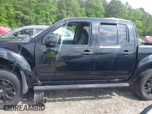 2018 Nissan Frontier SV with VIN 1N6AD0EV0JN744891, listed as a IAAI auction lot 42128481 with 137,412 mi miles and . Bid and sale history available at DreamBid. Image 14.