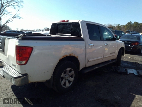 2005 Nissan Titan SE with VIN 1N6AA07B25N514643, listed as a IAAI auction lot 32638857 with 214,304 mi miles. Bid and sale history available at carsss.com. Image 4.