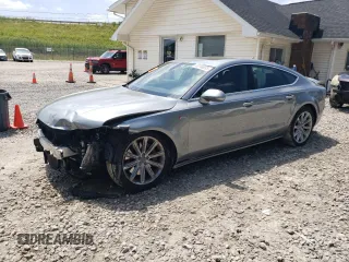 2012 Audi A7 Premium Plus with VIN WAUYGAFC0CN051914, listed as a Copart auction lot 63140035 with 187,404 mi miles and Salvage title. Bid and sale history available at DreamBid. Image 1.