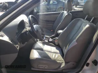 2000 Nissan Maxima GXE z VIN JN1CA31D2YT523871, wystawiony jako Copart lot #65902984 z przebiegiem 235 064 mil mil oraz Szkoda całkowita • Salvage title. Historia ofert i sprzedaży dostępna na DreamBid. Obrazek 7.