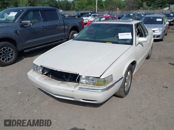 2000 Cadillac Eldorado Touring ETC z VIN 1G6ET129XYU162451, wystawiony jako IAAI lot #42412406 z przebiegiem 89 413 mil mil oraz . Historia ofert i sprzedaży dostępna na DreamBid. Obrazek 6.