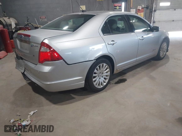 2011 Ford Fusion Hybrid with VIN 3FADP0L3XBR204073, listed as a IAAI auction lot 42570053 with 179,821 mi miles and . Bid and sale history available at DreamBid. Image 4.