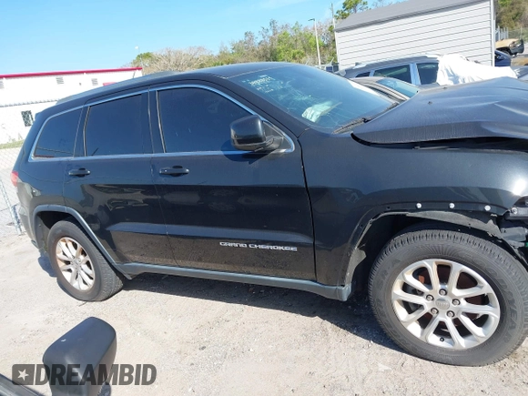 2014 Jeep Grand Cherokee Laredo with VIN 1C4RJEAG7EC263590, listed as a IAAI auction lot 41699106 with 136,581 mi miles and . Bid and sale history available at DreamBid. Image 14.