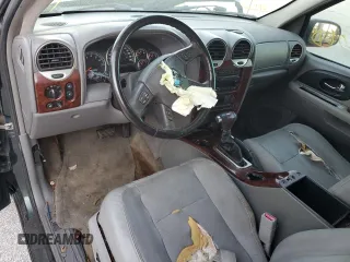 2005 GMC Envoy SLT with VIN 1GKDS13S652329610, listed as a Copart auction lot 76384914 with Not Provided miles and Salvage Title. Bid and sale history available at DreamBid. Image 8.