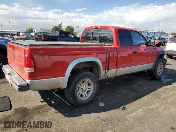 2001 Dodge Dakota Sport with VIN 1B7GG22N61S213300, listed as a Copart auction lot 76581804 with 105,460 mi miles and Salvage Title. Bid and sale history available at carsss.com. Image 3.