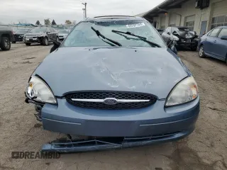 2000 Ford Taurus SEL with VIN 1FAFP56S2YG160062, listed as a Copart auction lot 82297744 with 97,218 mi miles and Salvage title. Bid and sale history available at DreamBid. Image 5.