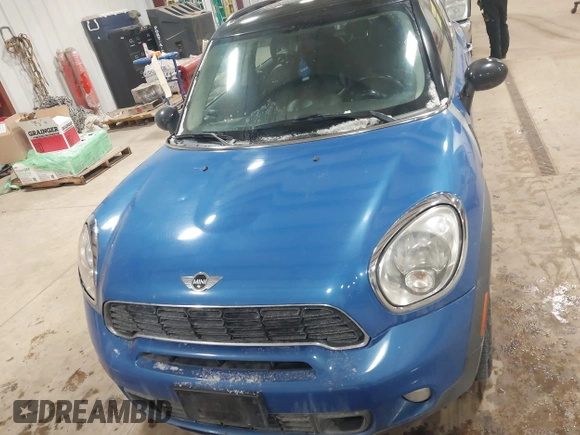 2013 MINI Countryman S ALL4 z VIN WMWZC5C59DWM16261, wystawiony jako IAAI lot #41563270 z przebiegiem 159 516 mil mil oraz . Historia ofert i sprzedaży dostępna na DreamBid. Obrazek 6.