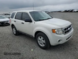 2011 Ford Escape XLS with VIN 1FMCU0C71BKB89898, listed as a Copart auction lot 52240445 with 180,201 mi miles and Salvage title. Bid and sale history available at DreamBid. Image 4.