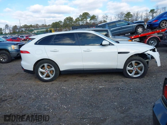 2020 Jaguar F-Pace 25t Premium with VIN SADCJ2FX3LA645447, listed as a IAAI auction lot 41228606 with 28,273 mi miles and . Bid and sale history available at DreamBid. Image 13.
