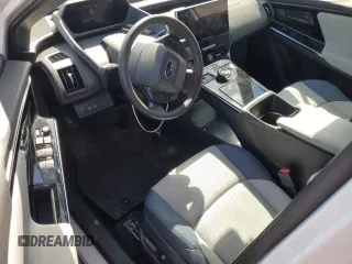 2023 Subaru Solterra Limited with VIN JTMABABA0PA004807, listed as a Copart auction lot 50586815 with 10,879 mi miles and Salvage Title. Bid and sale history available at DreamBid. Image 8.