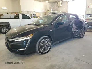 2018 Honda Clarity Plug-In Hybrid Touring with VIN JHMZC5F34JC019971, listed as a Copart auction lot 69590274 with 54,714 mi miles and Salvage Title. Bid and sale history available at carsss.com. Image 1.