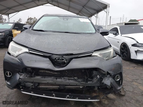 2018 Toyota RAV4 XLE with VIN JTMWFREV4JJ188776, listed as a IAAI auction lot 41525603 with 110,743 mi miles. Bid and sale history available at carsss.com. Image 12.