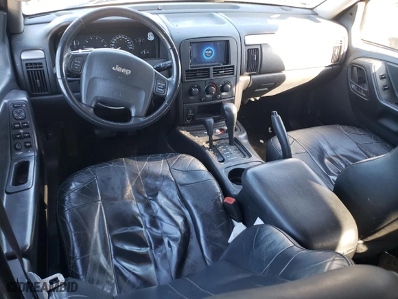 2003 Jeep Grand Cherokee Laredo with VIN 1J4GW48S13C588269, listed as a Copart auction lot 42303735 with 205,121 mi miles and Salvage Title. Bid and sale history available at carsss.com. Image 8.