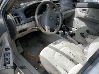 2006 Kia Spectra EX with VIN KNAFE121665348840, listed as a Copart auction lot 69798184 with 0 mi miles and Salvage Title. Bid and sale history available at carsss.com. Image 8.