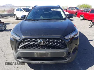 2022 Toyota Corolla Cross LE with VIN 7MUCAABG1NV033299, listed as a Copart auction lot 58018825 with 28,138 mi miles and Salvage title. Bid and sale history available at DreamBid. Image 5.
