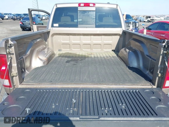 2010 Dodge 1500 SLT z VIN 1D7RV1CT7AS229291, wystawiony jako IAAI lot #41566144 z przebiegiem 130 639 mil mil oraz . Historia ofert i sprzedaży dostępna na DreamBid. Obrazek 17.