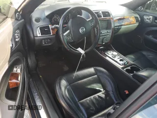 2010 Jaguar XK with VIN SAJWA4DC1AMB38762, listed as a Copart auction lot 73865884 with 98,030 mi miles and Salvage Title. Bid and sale history available at carsss.com. Image 8.