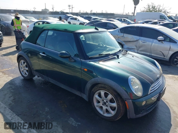 2006 MINI Convertible with VIN WMWRF33566TG15710, listed as a IAAI auction lot 41636955 with Not Provided miles and . Bid and sale history available at DreamBid. Image 1.