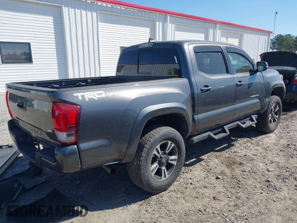 2017 Toyota Tacoma SR5 with VIN 5TFAZ5CN7HX033594, listed as a IAAI auction lot 41881117 with 86,676 mi miles and . Bid and sale history available at DreamBid. Image 4.
