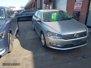 2013 Volkswagen Passat TDI SEL Premium with VIN 1VWCN7A38DC012155, listed as a IAAI auction lot 41687427 with 141,874 mi miles. Bid and sale history available at carsss.com. Image 1.