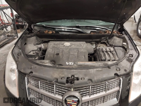2011 Cadillac SRX Performance Collection with VIN 3GYFNEEY9BS675746, listed as a IAAI auction lot 41735676 with 113,079 mi miles and . Bid and sale history available at carsss.com. Image 10.