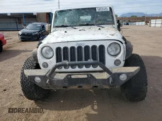 2016 Jeep Wrangler Willys Wheeler z VIN 1C4AJWAG4GL243285, wystawiony jako Copart lot #58035425 z przebiegiem 100 251 mil mil oraz Szkoda całkowita • Salvage title. Historia ofert i sprzedaży dostępna na DreamBid. Obrazek 5.