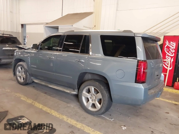 2016 Chevrolet Tahoe LTZ with VIN 1GNSKCKC3GR346276, listed as a IAAI auction lot 41646214 with 102,625 mi miles and . Bid and sale history available at DreamBid. Image 3.
