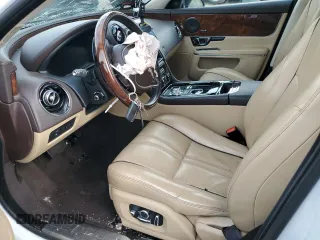2019 Jaguar XJ with VIN SAJWJ1CD5K8W19663, listed as a Copart auction lot 51071665 with 28,468 mi miles and Salvage Title. Bid and sale history available at carsss.com. Image 7.