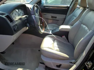 2005 Chrysler 300 C with VIN 2C3AA63H15H525775, listed as a Copart auction lot 52018135 with 59,098 mi miles and Salvage Title. Bid and sale history available at DreamBid. Image 7.