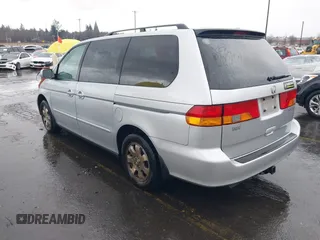2004 Honda Odyssey EX-L with VIN 5FNRL18934B016420, listed as a IAAI auction lot 41473237 with 188,659 mi miles and . Bid and sale history available at DreamBid. Image 3.