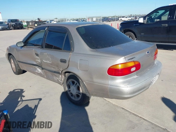 2001 Chevrolet Prizm with VIN 1Y1SK54811Z411948, listed as a IAAI auction lot 40874344 with 1 mi miles. Bid and sale history available at carsss.com. Image 3.