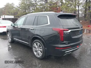 2022 Cadillac XT6 Premium Luxury z VIN 1GYKPDRS8NZ161368, wystawiony jako IAAI lot #41115620 z przebiegiem 140 819 mil mil oraz . Historia ofert i sprzedaży dostępna na DreamBid. Obrazek 3.