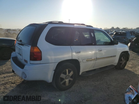 2005 GMC Envoy SLE с VIN 1GKDS13S852261326, выставлен на аукционе Copart как лот 42650025 с пробегом 210 485 миль миль и Списание • Salvage title. История ставок и продаж доступна на DreamBid. Изображение 3.