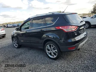 2013 Ford Escape Titanium z VIN 1FMCU0J95DUD15496, wystawiony jako Copart lot #45845915 z przebiegiem 157 078 mil mil oraz Szkody całkowita. Historia ofert i sprzedaży dostępna na DreamBid. Obrazek 2.
