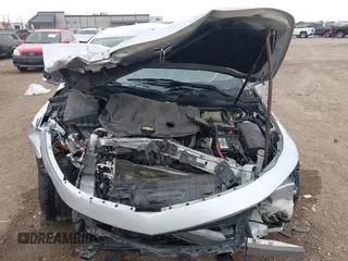 2014 Chevrolet Impala LT with VIN 2G1125S38E9102607, listed as a IAAI auction lot 41860235 with 128,599 mi miles and . Bid and sale history available at DreamBid. Image 10.